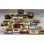 A collection of boxed modern die cast cars.