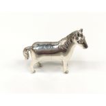 A well cast silver figure of a horse.