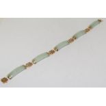 Jade and 9ct gold Chinese bracelet 7 Inches.