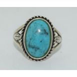 A large 925 silver ring set with oval Turquoise stone, Size P 1/2