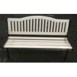 Vintage recently refurbished black painted cast iron two seater garden bench with white painted