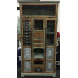 Modern rustic garage/shed tool storage unit fitted with several drawers and compartments