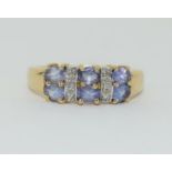 Topaz/Diamond 9ct gold ring, Size P.