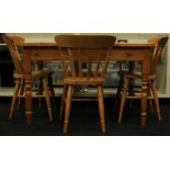 Solid Pine dining table together with three pine dining chairs 122x81x78cm.