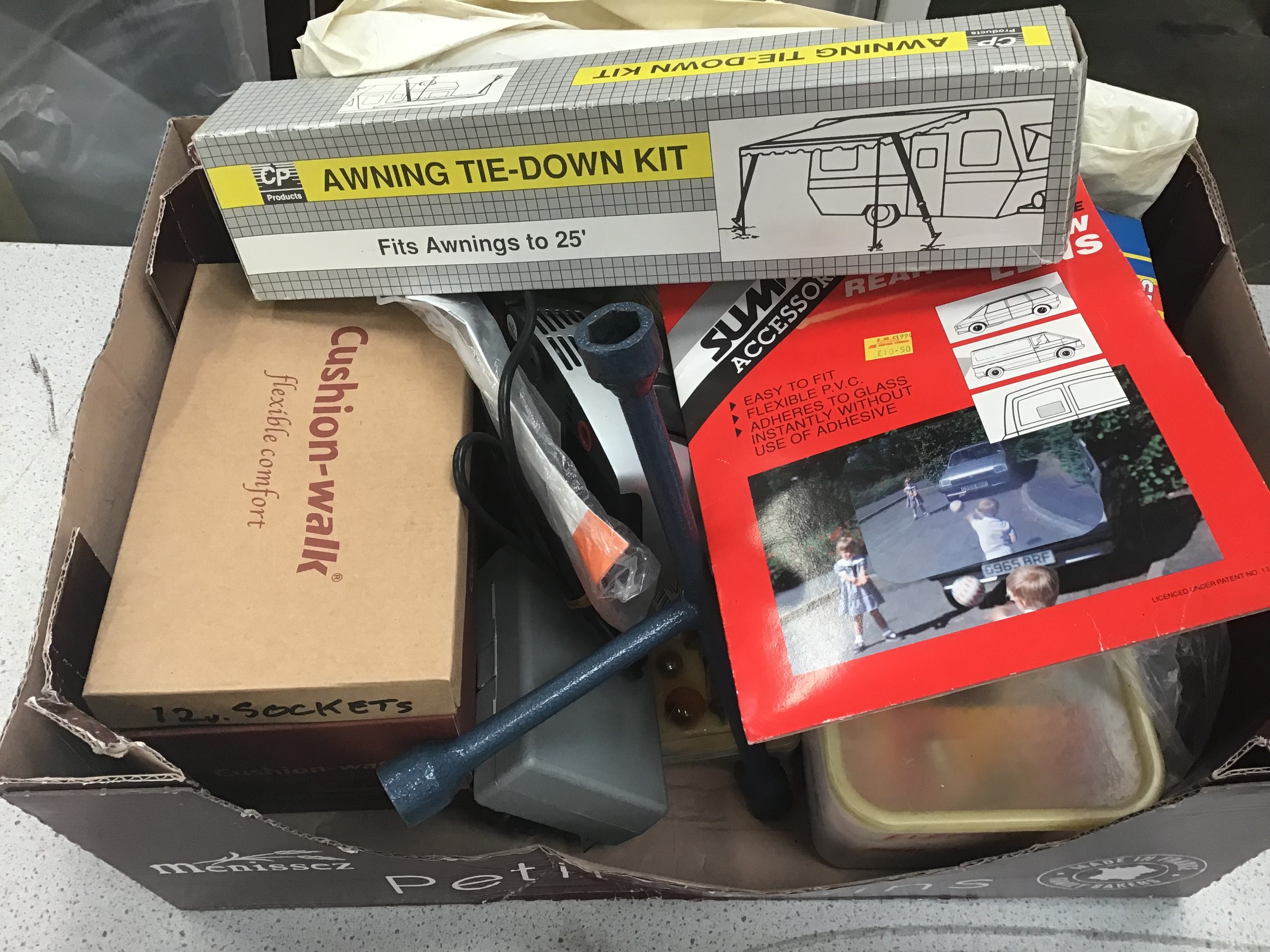 Box of various car accessories.