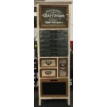 Modern rustic garage/shed tool storage unit fitted with several drawers and compartments