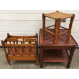 Mahogany square lamp table together with a magazine rack on castors and a rattan topped stool (3).