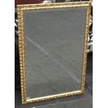Large over mantel gilt framed mirror. O/all size 69cm x 100cm.