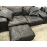 Black leather three seater settee with matching footstool. Settee: 227x88x66cm, Footstool: