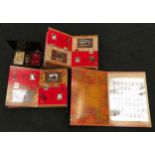 Large collection of Chinese stamps together with a set of oriental chess pieces.