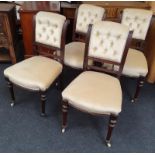 Four button backed mahogany Victorian saloon chairs on porcelain castors. O/all height 90cm seat