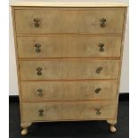 Bleached oak chest of five drawers.