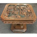 Oak stained as mahogany coffee table on single pedestal base with carved top 62x62x51cm.