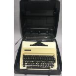 Vintage Adler Junior 10 type writer in carry case with instructions