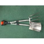 A stainless steel digging fork and spade (16).