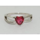 A sterling 925 silver ring with heart shaped red stone, Size L 1/2.