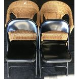 A pair of wicker conservatory chairs together with a pair of black folding habitat chairs.