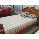 Carved pine decorative double bed frame and mattress 215x162x115cm. Mattress height 60cm.