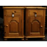 pair of pine bedside cabinets, each 70cm tall x 35cm wide x 39cm deep. 1 drawer over 1 door.