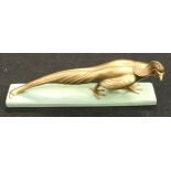 Gold painted Art Deco pheasant signed to the base 66x13x27cm.