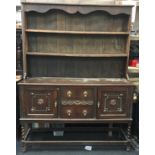 Antique oak two part dresser on barley twist supports 201x151x48cm.