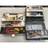 3 plastic tool boxes with various tools.