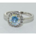 A Sterling Silver ring Marked S925 BZ, with opalescent stone to centre, Size N