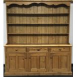 Large pitch pine two part dresser 213x192x47cm.