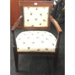 Mahogany framed bedroom chair with bee patterned upholstery 81x42x54cm.
