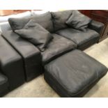 Black leather three seater settee with matching footstool. Settee: 227x88x66cm, Footstool: