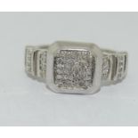 A heavy 925 TGGC silver and CZ ring, Size Q