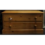 Pine low chest of two drawers. 102cm wide x 53cm tall x 50cm deep