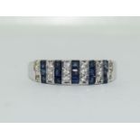 A 9ct gold, sapphire and diamond ring, Size S 1/2,