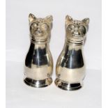 A pair of large silver plated cat condiments.