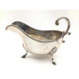 A solid silver hallmarked sauce boat.