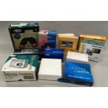 A collection of modern boxed cameras and binoculars to include praktica, Baypa etc.