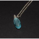 An unusual White gold diamond set blue Topaz perfume bottle pendant necklace.
