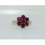 9ct gold ladies garnet and diamond shoulder daisy cluster ring size N