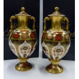 Royal Crown Derby Old Imari pair of lidded Sudbury vases in original boxes. 20cm tall