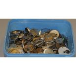 A box of watch movements.