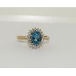 9ct gold ladies diamond and blue tourmaline cluster ring size K
