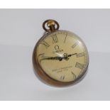 A large brass and glass desk ball clock.
