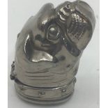 A silver plated novelty vest case of a boxer dog.