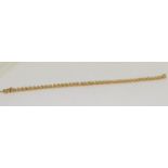 A 14ct yellow gold diamond tennis bracelet of 3.5cts approx.