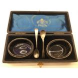 Pair of silver hallmarked salts with Bristol Blue glass liners together with a pair of silver