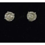 A pair of 14ct white gold diamond stud earrings of 2.5cts.