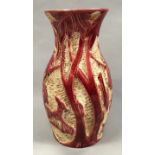 Beswick vase depicting deer and an owl in red glaze 25cm in height.