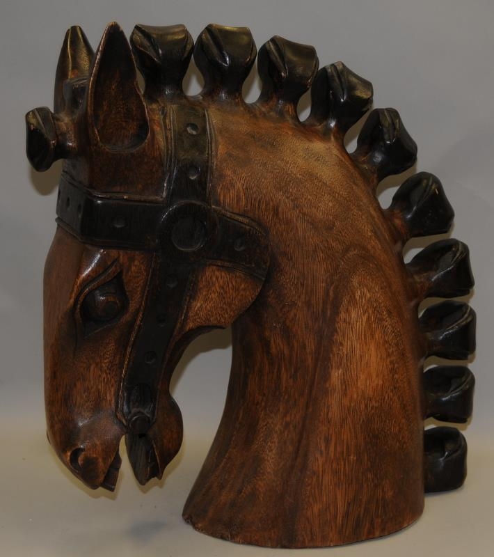 A large carved horses head. O/all height 19"