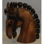 A large carved horses head. O/all height 19"
