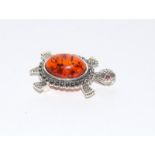 A silver marcasite and amber turtle brooch pendant.